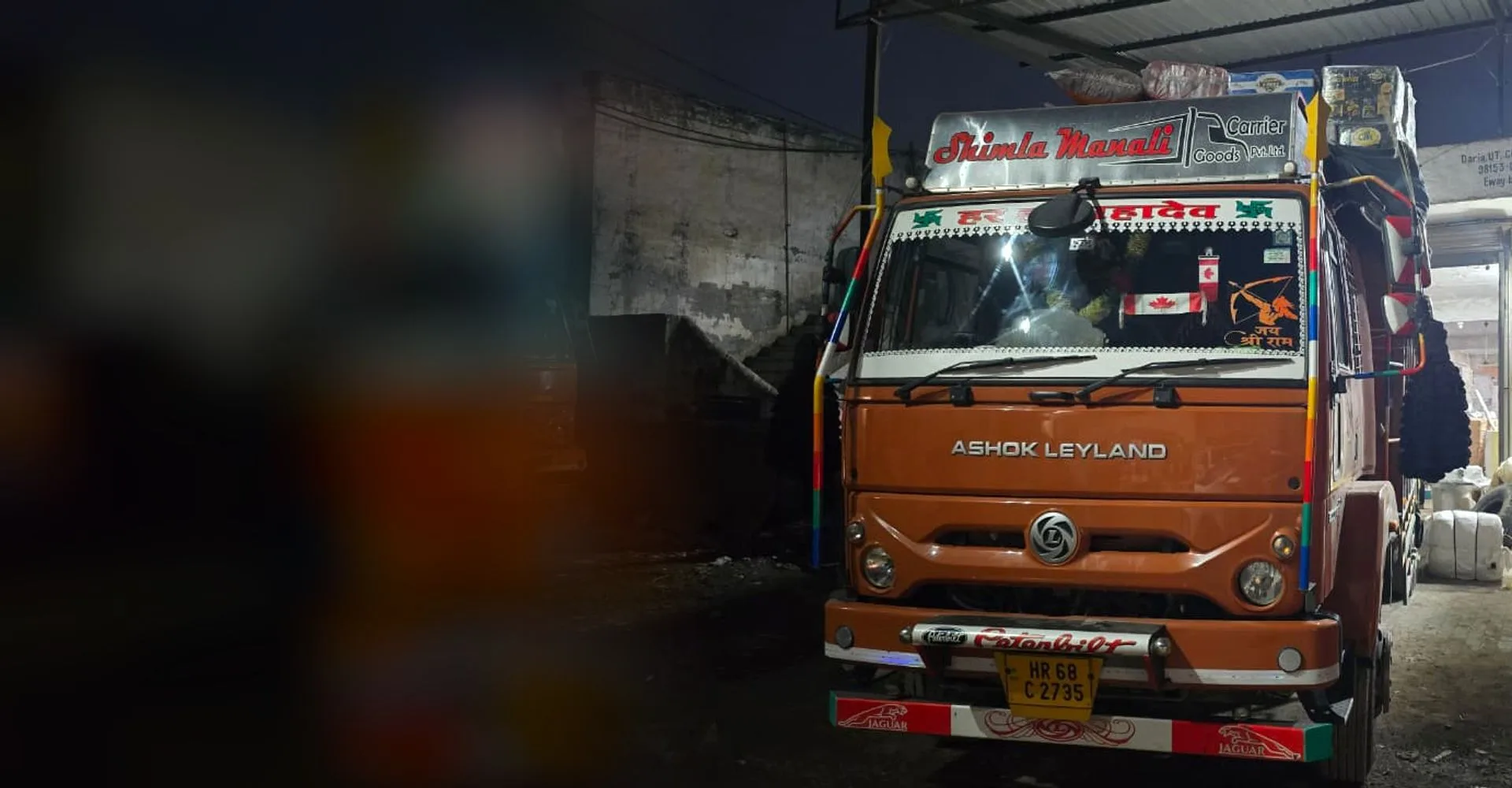 Shimla Manali Goods Carrier branded Ashok Leyland truck loaded for dispatch all over Himachal Pradesh
